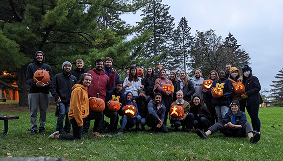 Photo of students with their pumpkins