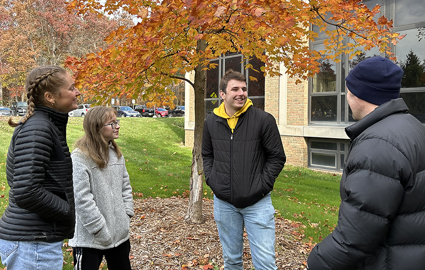 Photo of students outside in Autumn